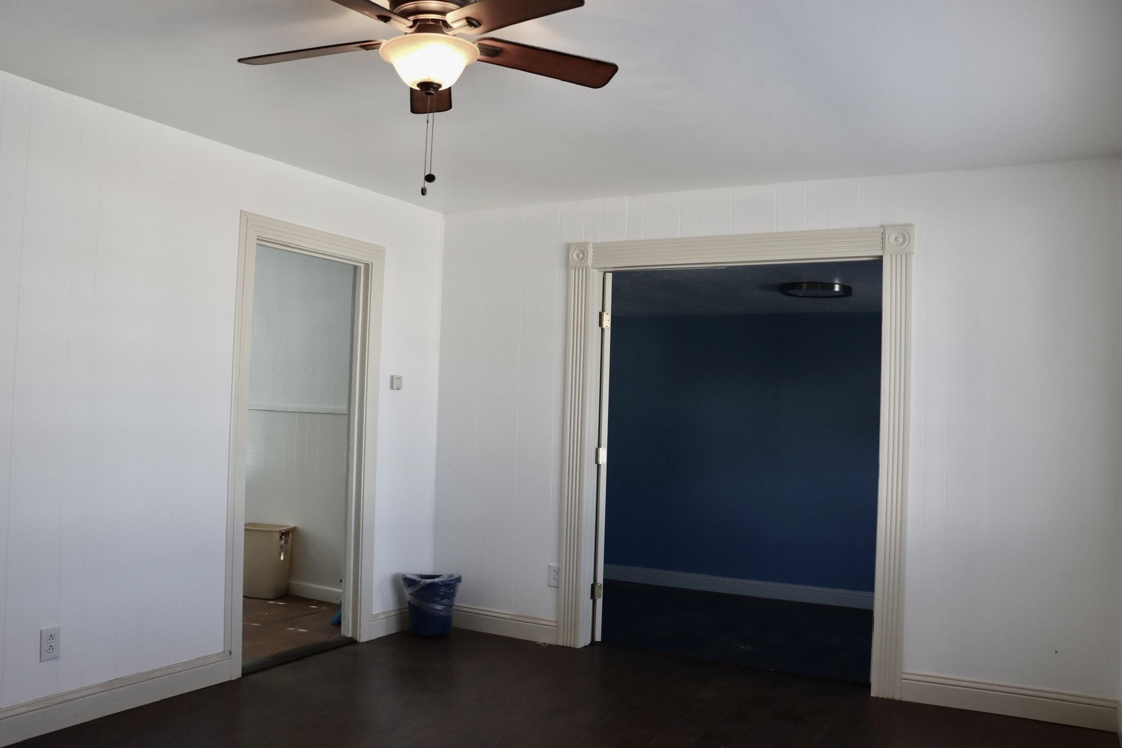 1511 36th Street Lubbock, TX 79412 - Photo 2 of 13 a view of room with window and ceiling fan