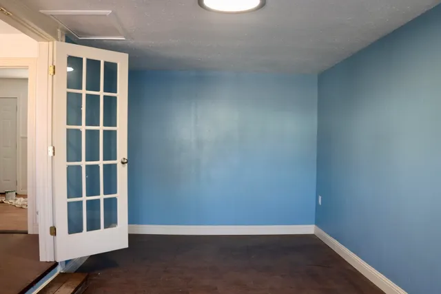 an empty room with windows