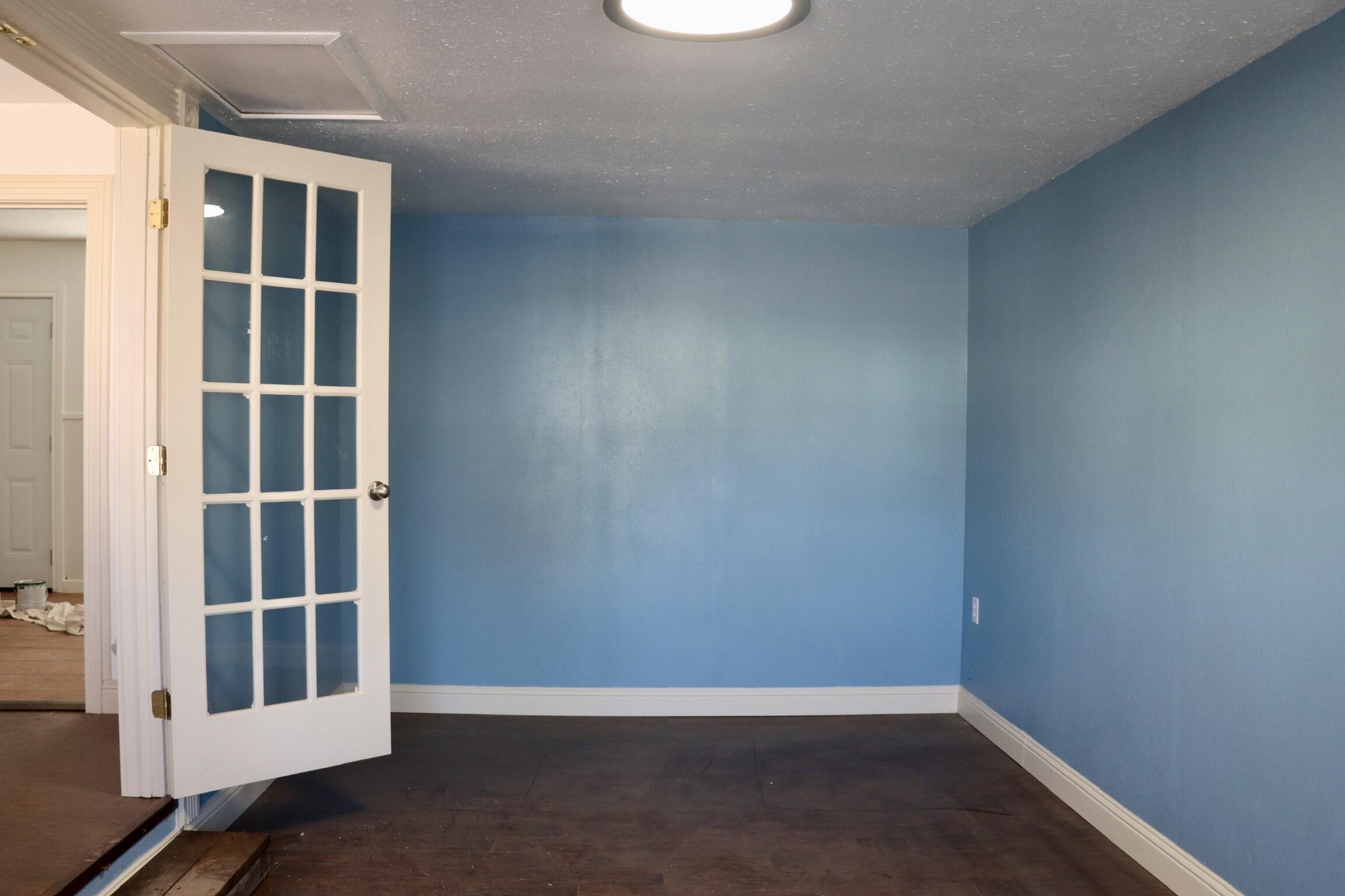 1511 36th Street Lubbock, TX 79412 - Photo 5 of 13 an empty room with windows