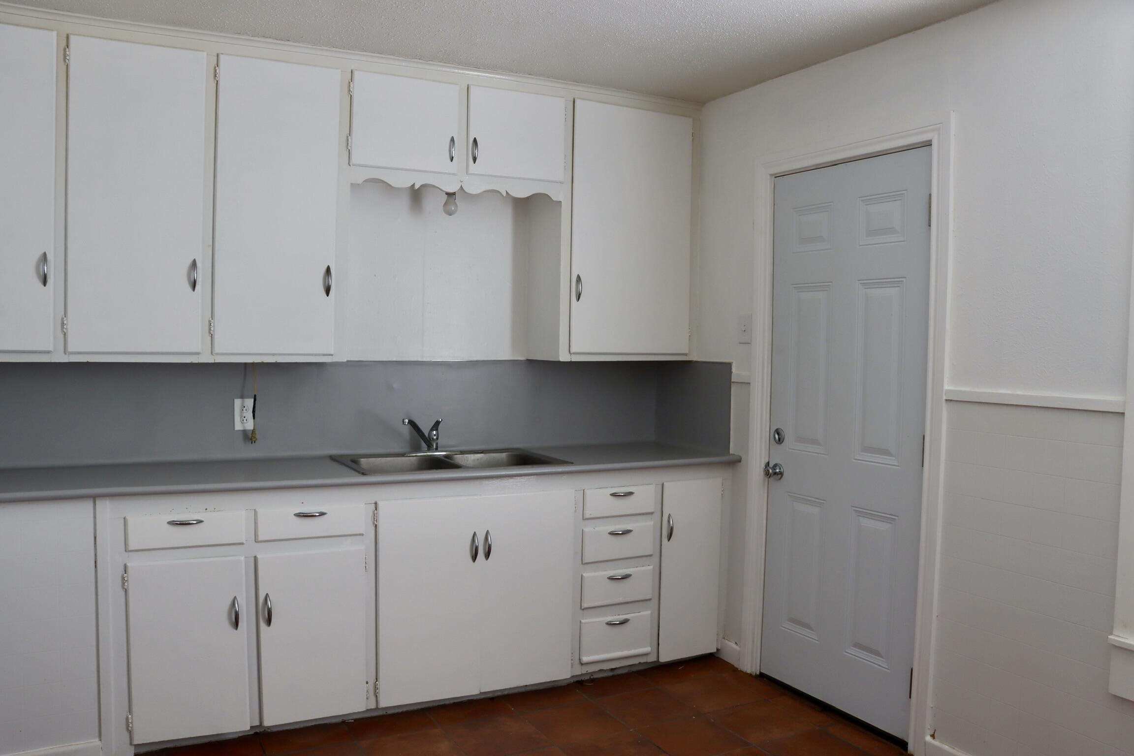 1511 36th Street Lubbock, TX 79412 - Photo 7 of 13 a view of cabinets