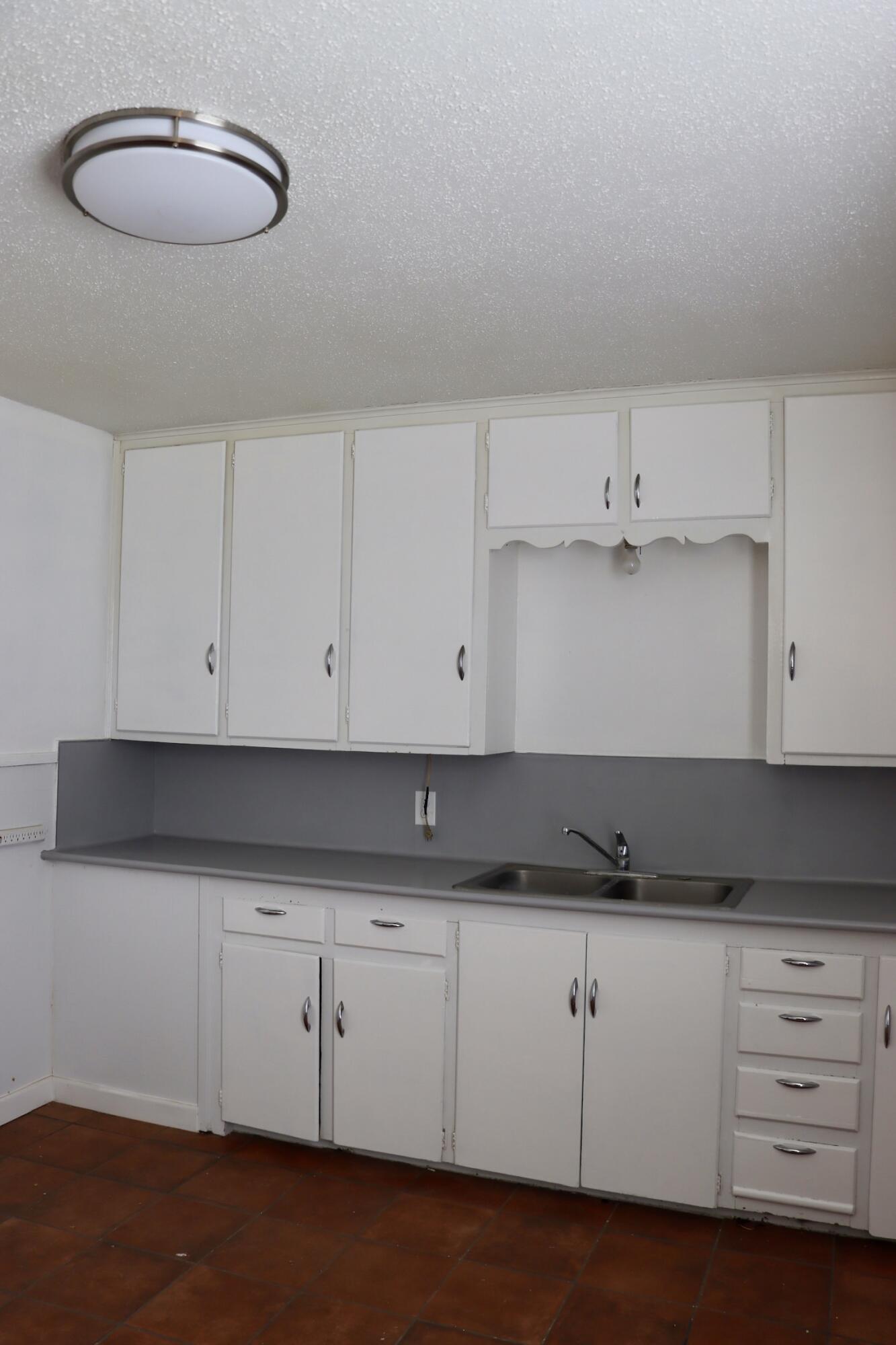 1511 36th Street Lubbock, TX 79412 - Photo 8 of 13 a view of cabinets