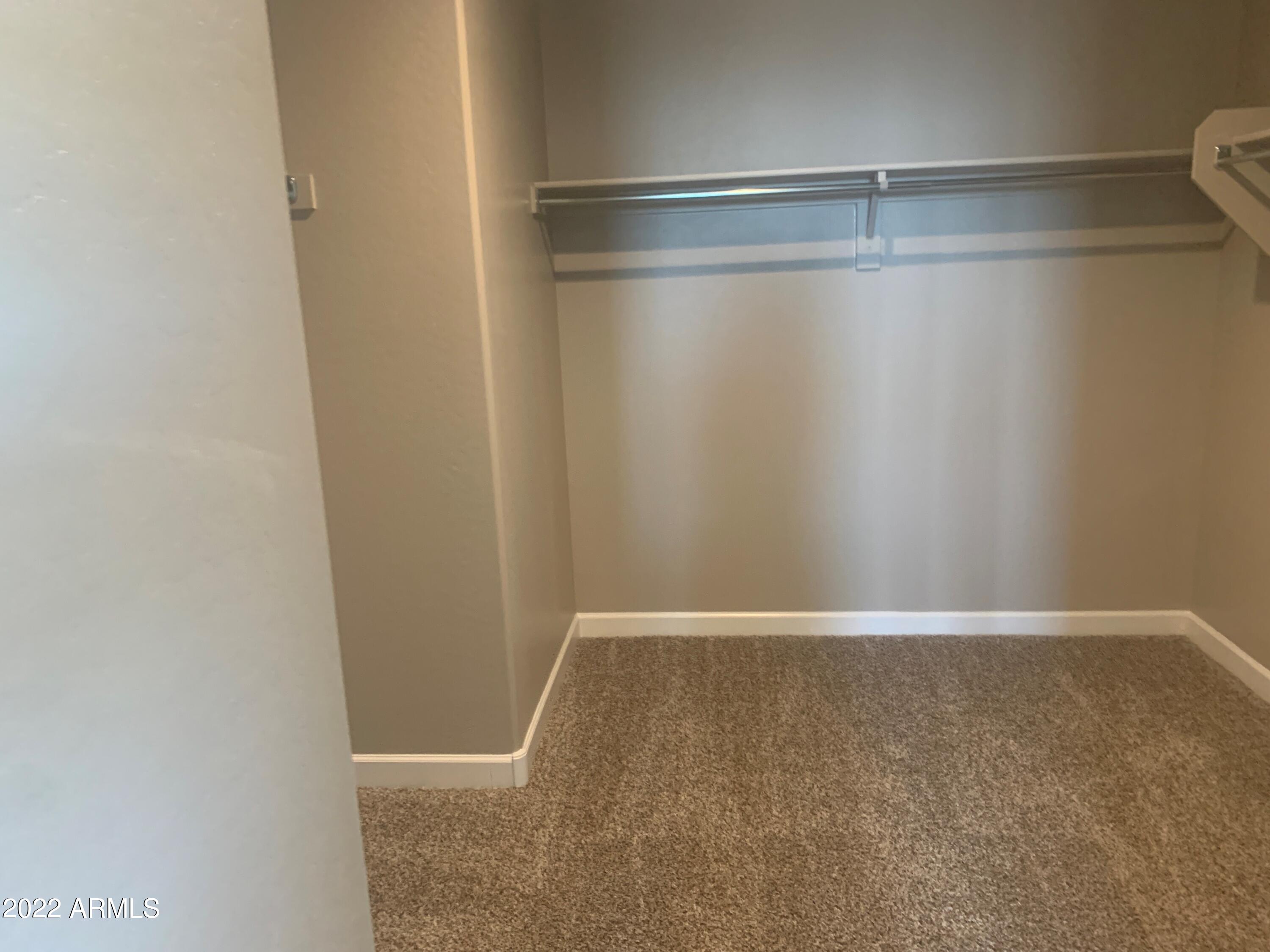 23960 West Ripple Road Buckeye, AZ 85326 - Photo 14 of 16 Harris Br 1 Closet