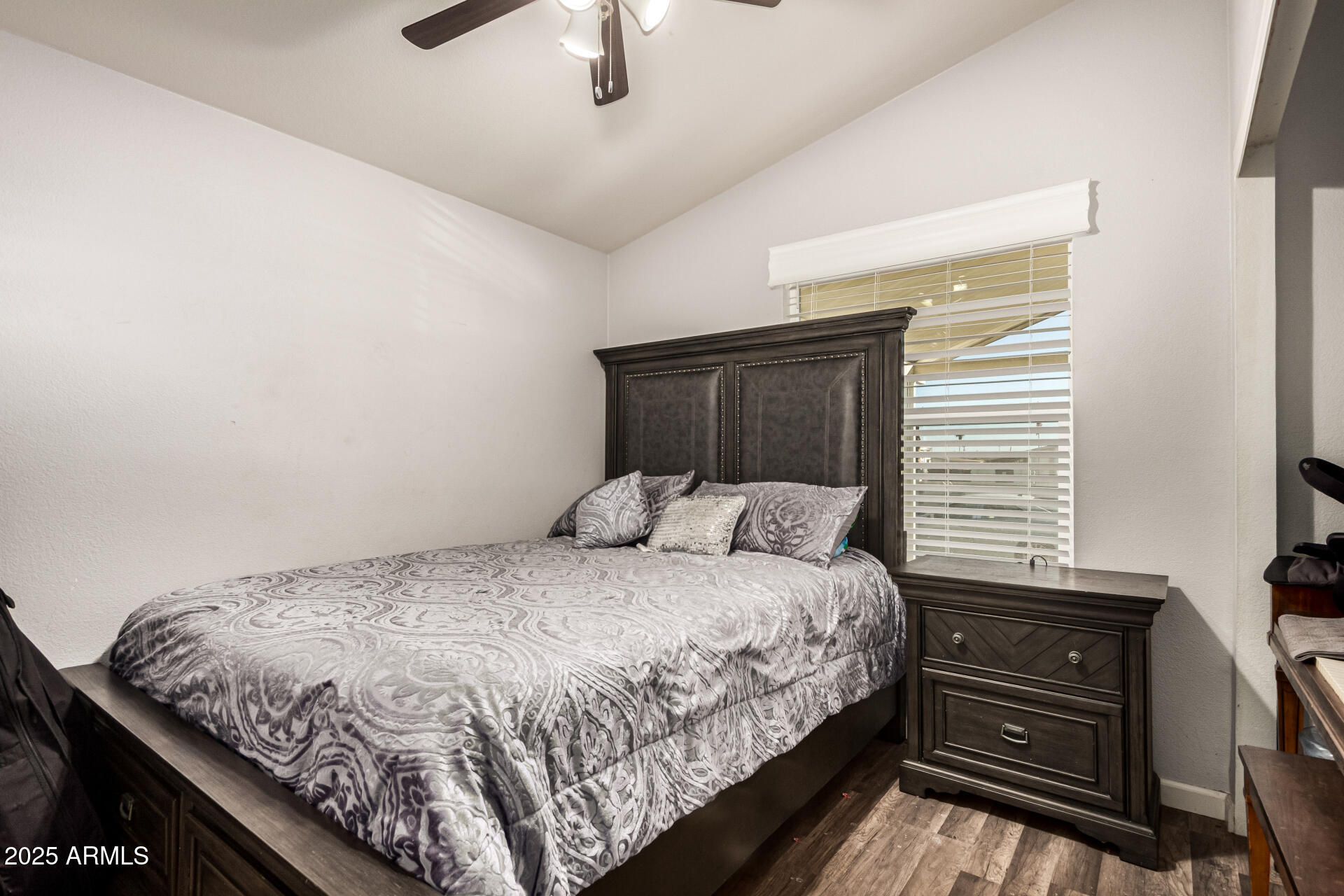 9431 East Coralbell Avenue, Unit 80 Mesa, AZ 85208 - Photo 14 of 22 a bedroom with a bed and a window
