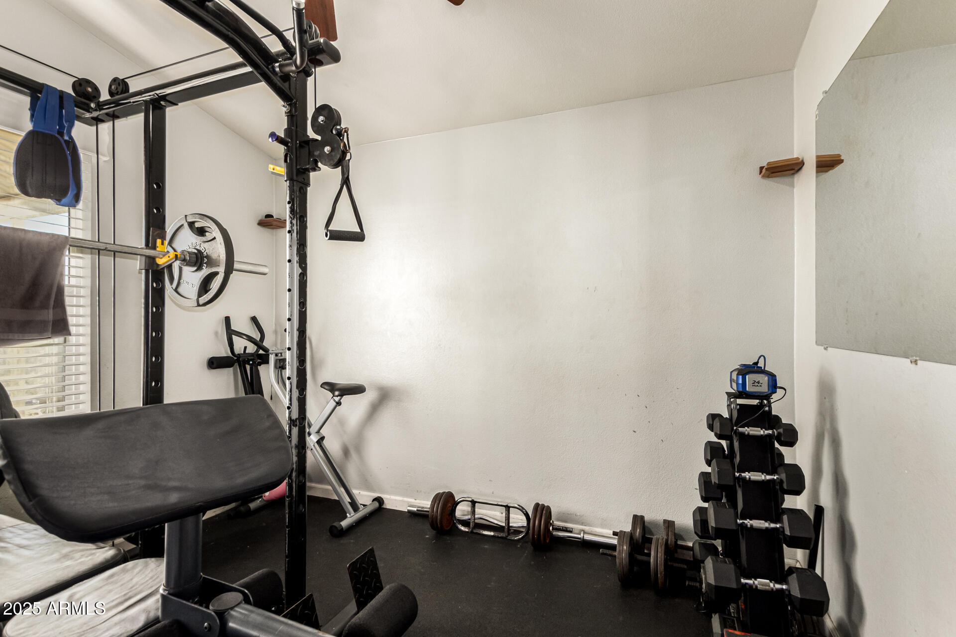 9431 East Coralbell Avenue, Unit 80 Mesa, AZ 85208 - Photo 16 of 22 a view of a room with gym equipment