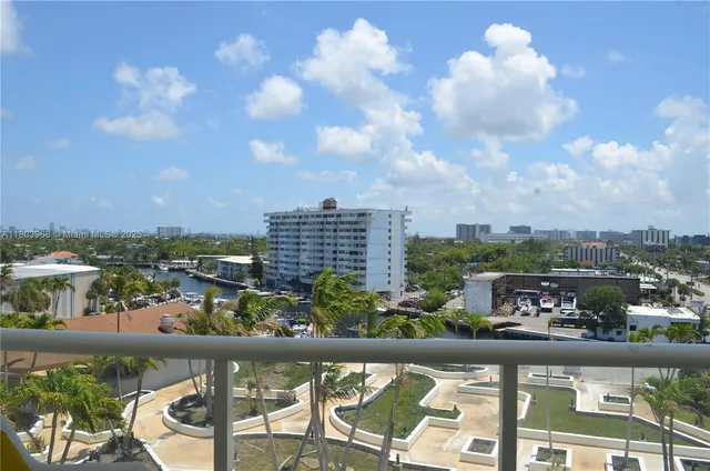 a view of a city skyline from a balcony
