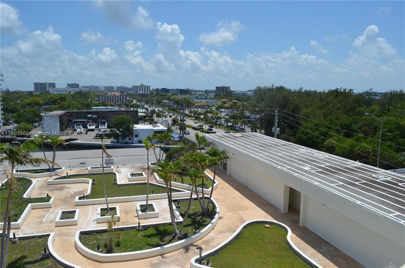 13499 Biscayne Boulevard, Unit 702 North Miami, FL 33181 - Photo 24 of 31 a picture of city view with lake view and mountain view in back