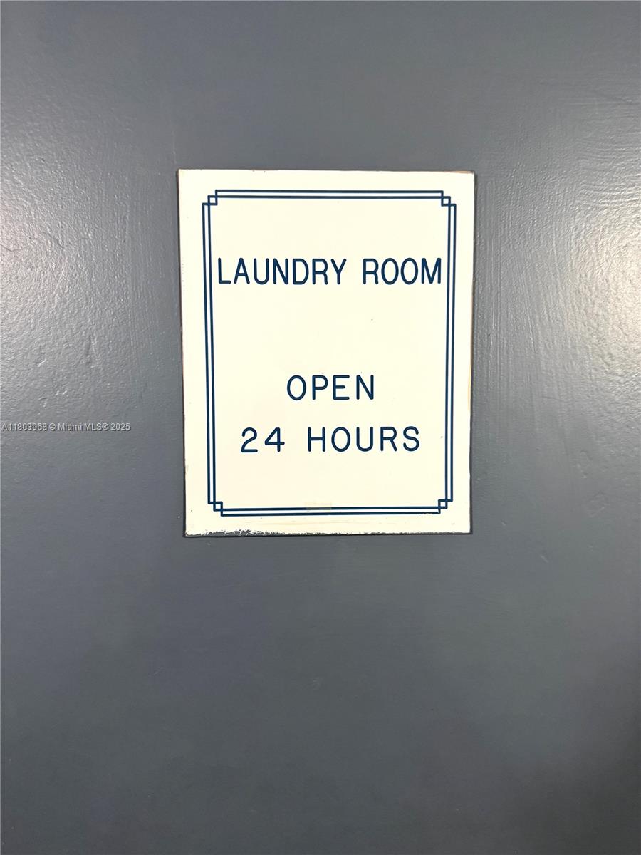 13499 Biscayne Boulevard, Unit 702 North Miami, FL 33181 - Photo 25 of 31 a sign that is on a wall