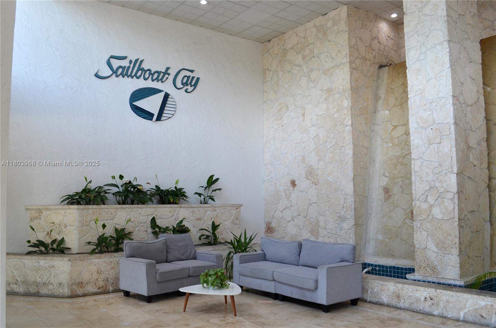 13499 Biscayne Boulevard, Unit 702 North Miami, FL 33181 - Photo 3 of 31 a living room with furniture