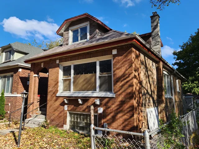 a front view of a house with balcony