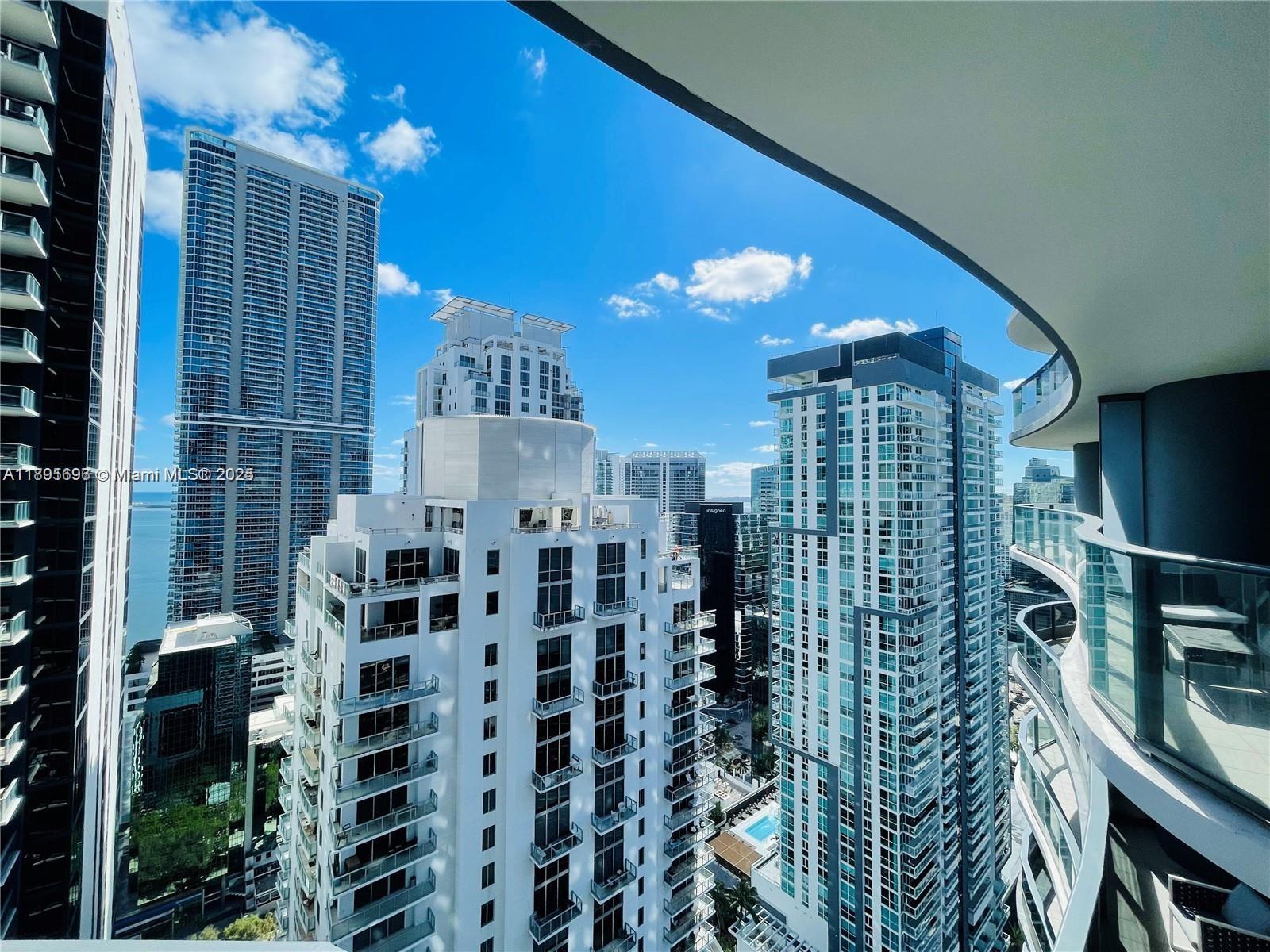 1000 Brickell Plaza, Unit 3905 Miami, FL 33131 - Photo 16 of 18 a view of a room with windows