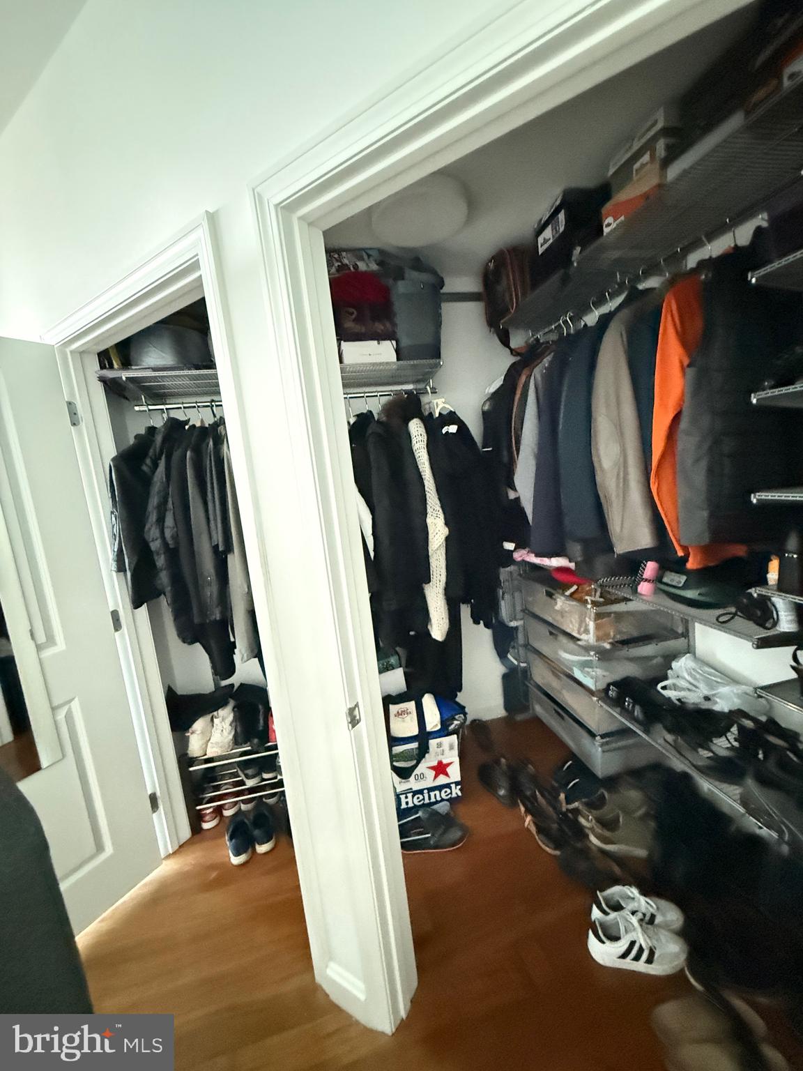 901 North Penn Street, Unit R2101 Philadelphia, PA 19123 - Photo 32 of 33 a view of walk in closet with clothes and shoes