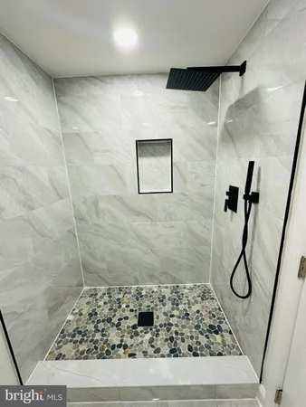 a bathroom with a sink and mirror