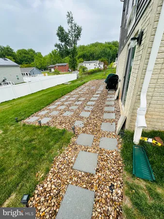 a view of a garden with an outdoor space