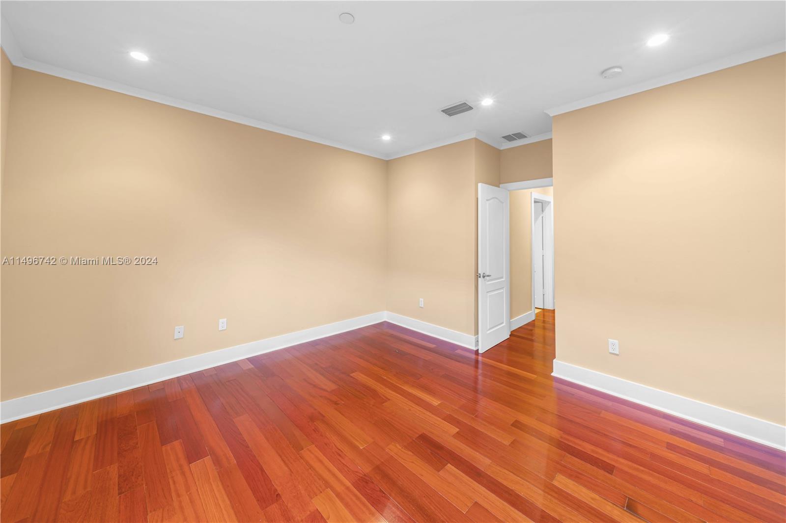 2829 Coconut Avenue, Unit 2829 Miami, FL 33133 - Photo 15 of 28 a view of empty room with wooden floor