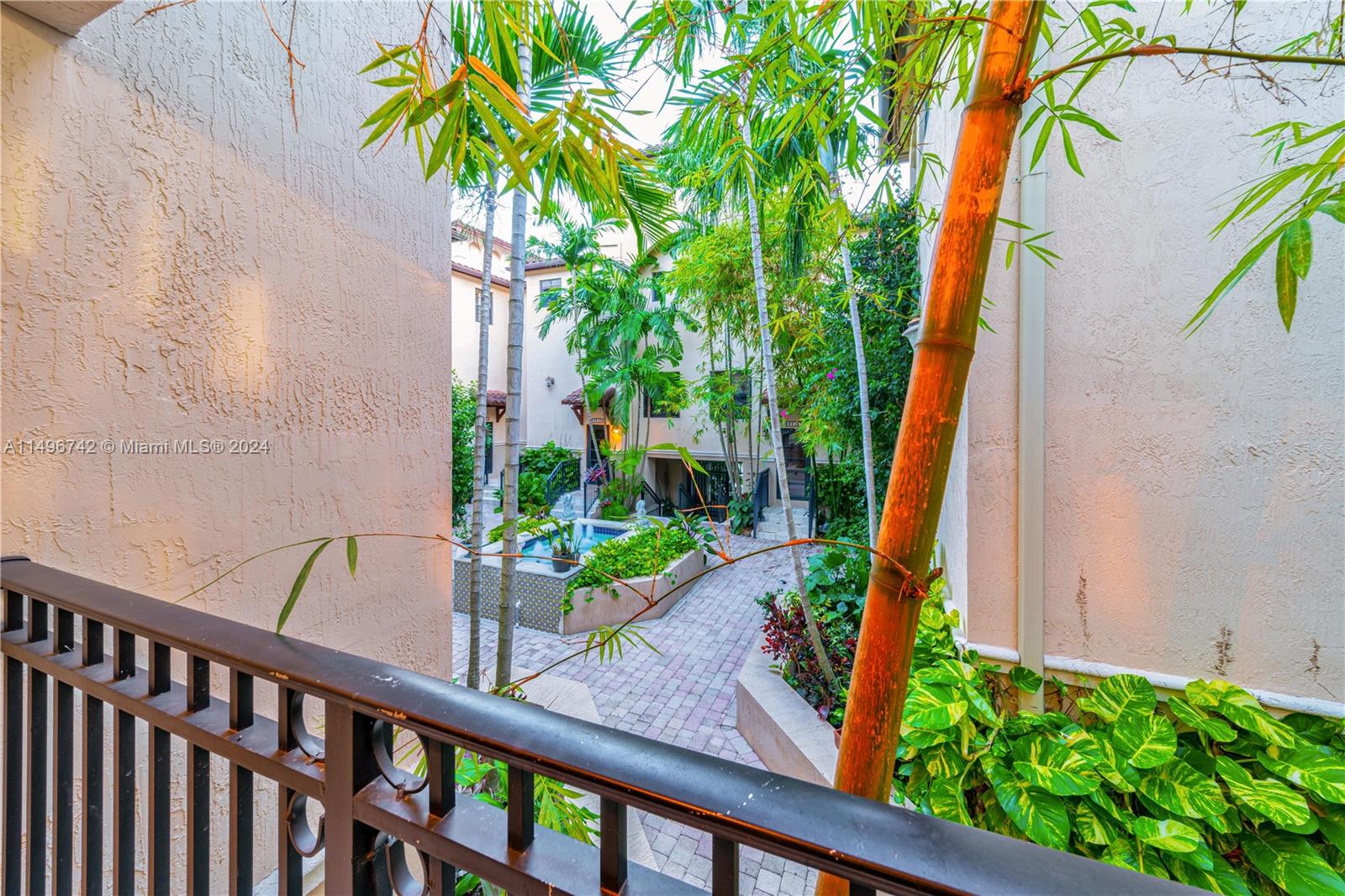 2829 Coconut Avenue, Unit 2829 Miami, FL 33133 - Photo 21 of 28 a view of a garden from a balcony