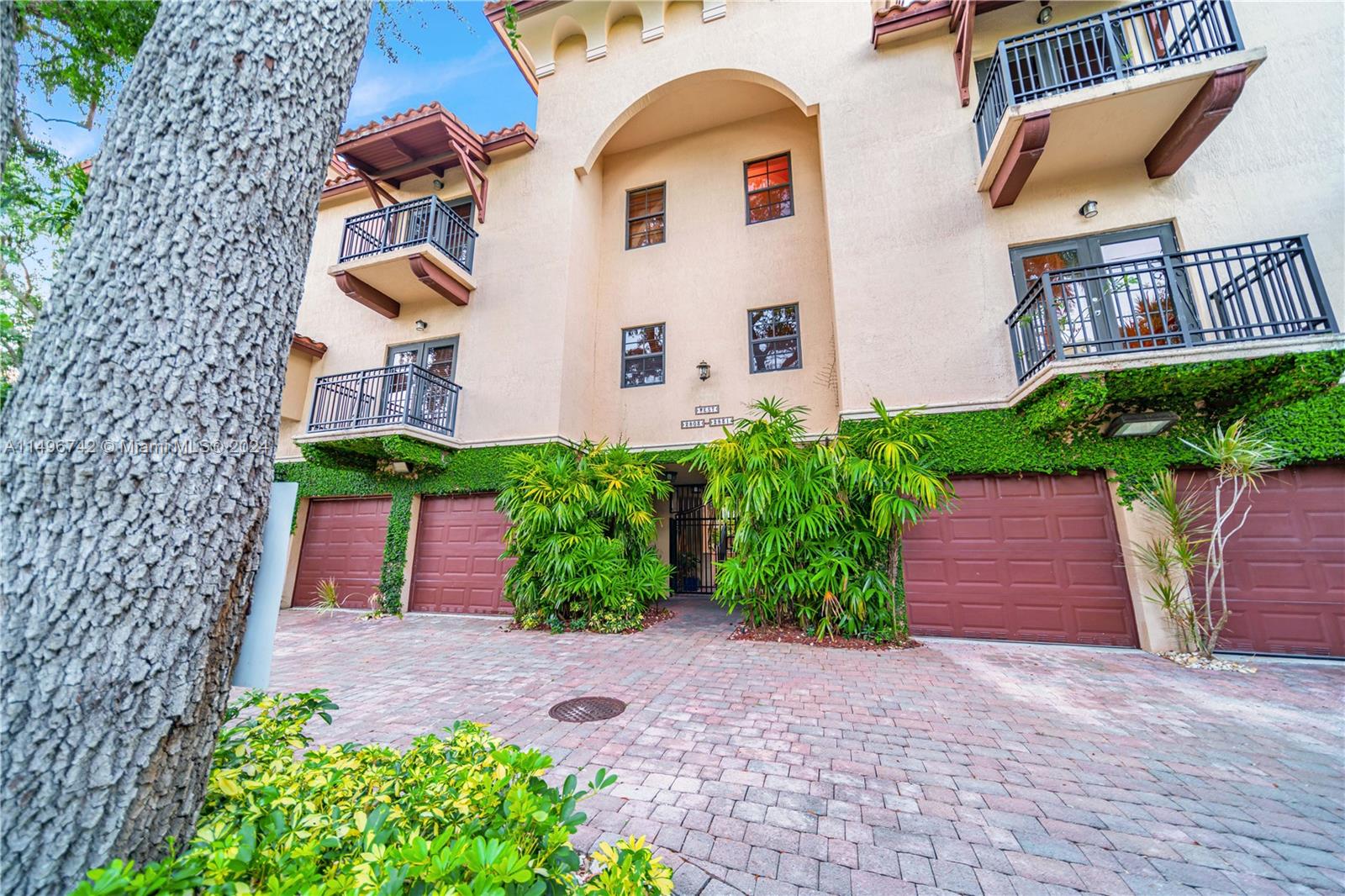 2829 Coconut Avenue, Unit 2829 Miami, FL 33133 - Photo 25 of 28 a front view of a house with garden
