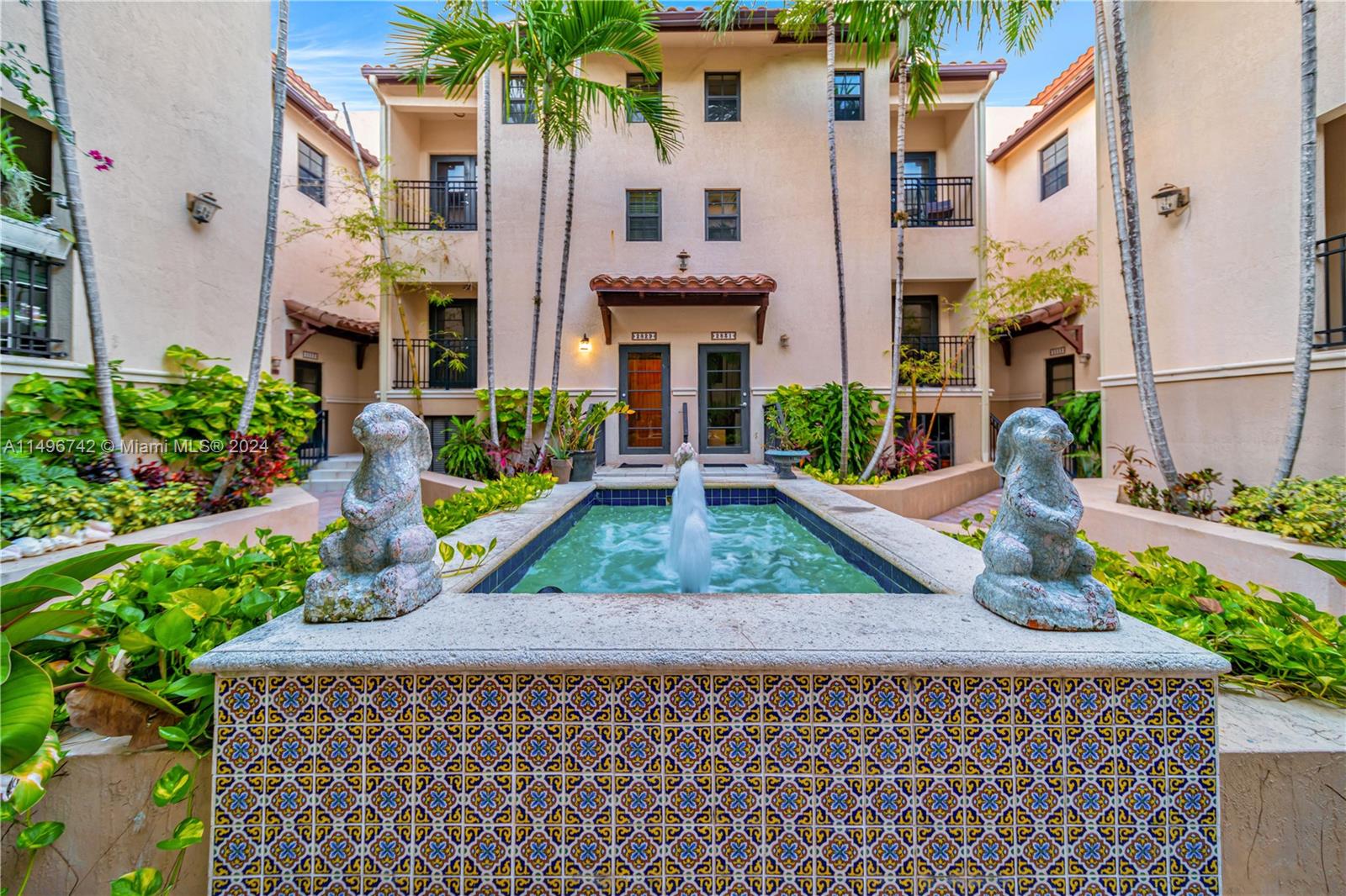 2829 Coconut Avenue, Unit 2829 Miami, FL 33133 - Photo 3 of 28 front view of a house with a yard