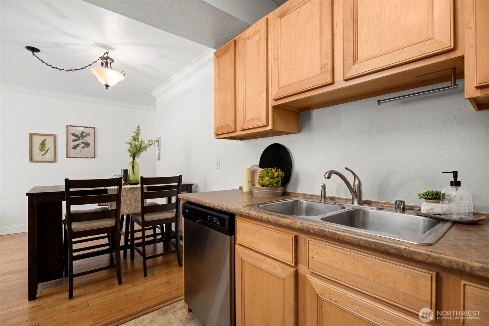 1001 North State Street, Unit 403 Bellingham, WA 98225 - Photo 19 of 34 a kitchen with stainless steel appliances granite countertop a sink and cabinets