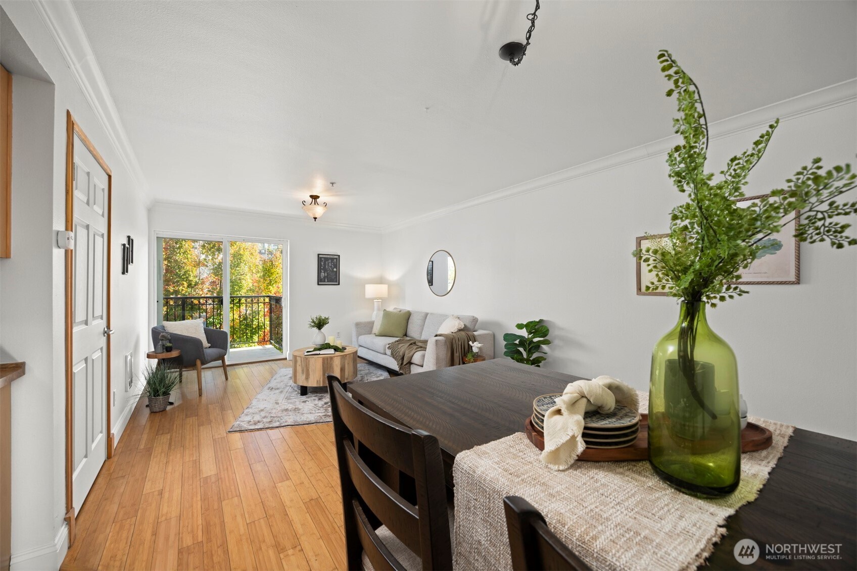 1001 North State Street, Unit 403 Bellingham, WA 98225 - Photo 20 of 34 a living room with furniture and a potted plant