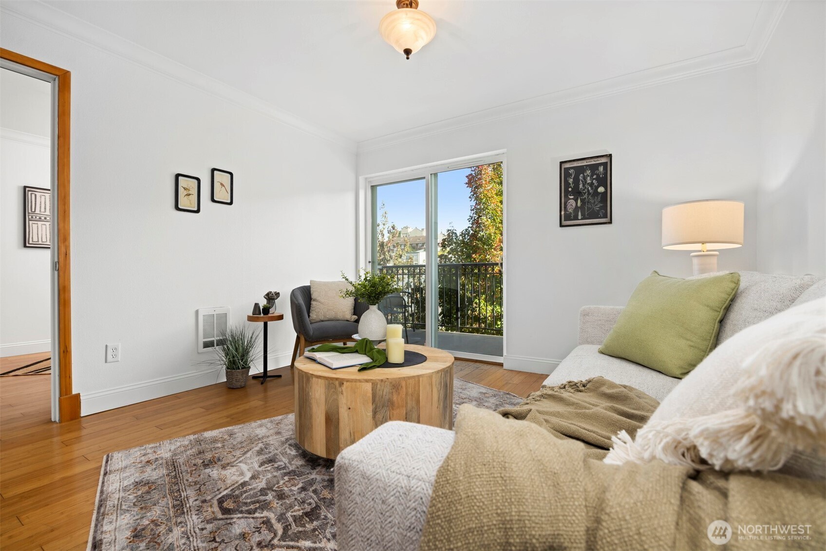1001 North State Street, Unit 403 Bellingham, WA 98225 - Photo 24 of 34 a living room with furniture and a rug