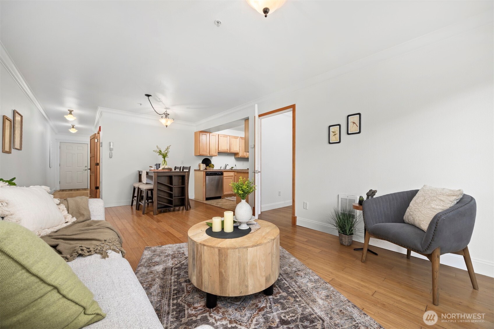 1001 North State Street, Unit 403 Bellingham, WA 98225 - Photo 27 of 34 a living room with furniture and a table