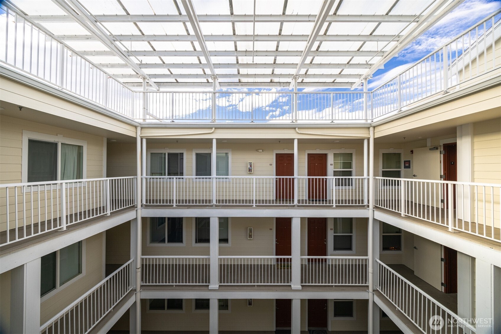 1001 North State Street, Unit 403 Bellingham, WA 98225 - Photo 34 of 34 a large building with a lot of windows