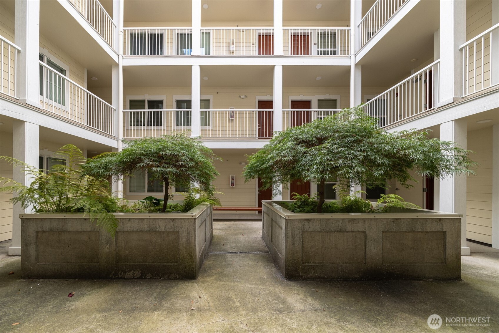 1001 North State Street, Unit 403 Bellingham, WA 98225 - Photo 4 of 34 a view of a house and outdoor kitchen