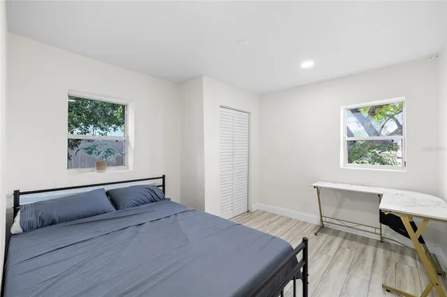 a room with a bed and a table