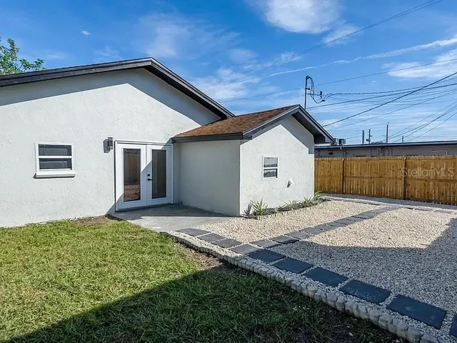 a view of backyard of a house