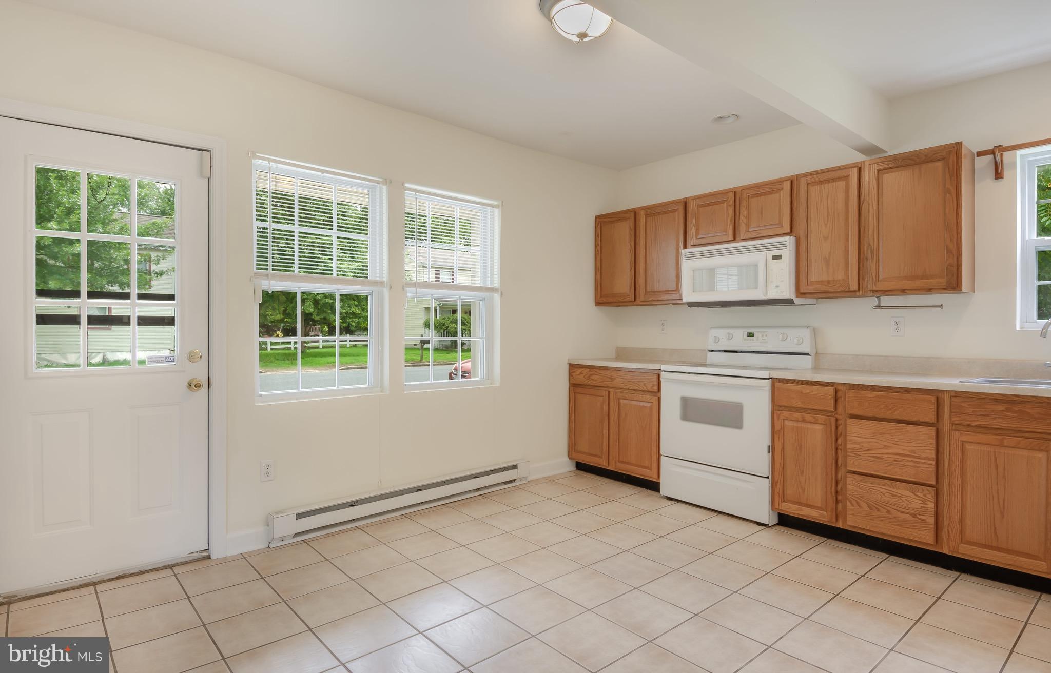 202 West Railroad Street Ridgely, MD 21660 - Photo 6 of 30 Plenty of cabinetry and ceramic tile flooring