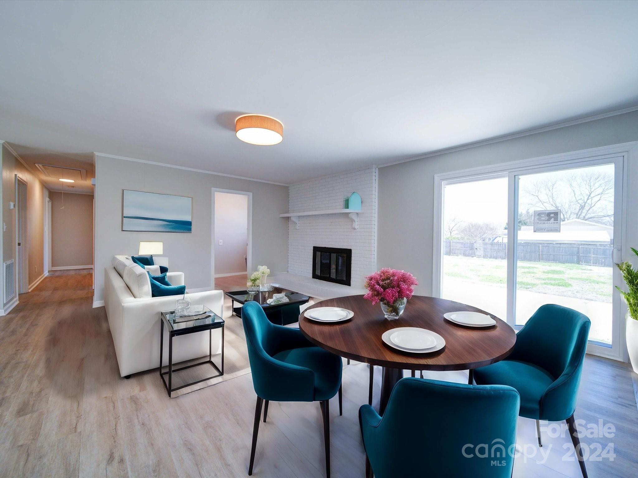 101 Hedgestone Drive Gastonia, NC 28056 - Photo 19 of 39 a living room with furniture and a table