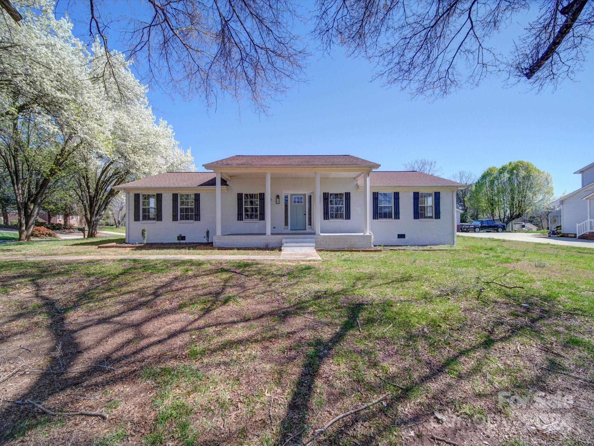 101 Hedgestone Drive Gastonia, NC 28056 - Photo 2 of 39 a view of a house with a backyard