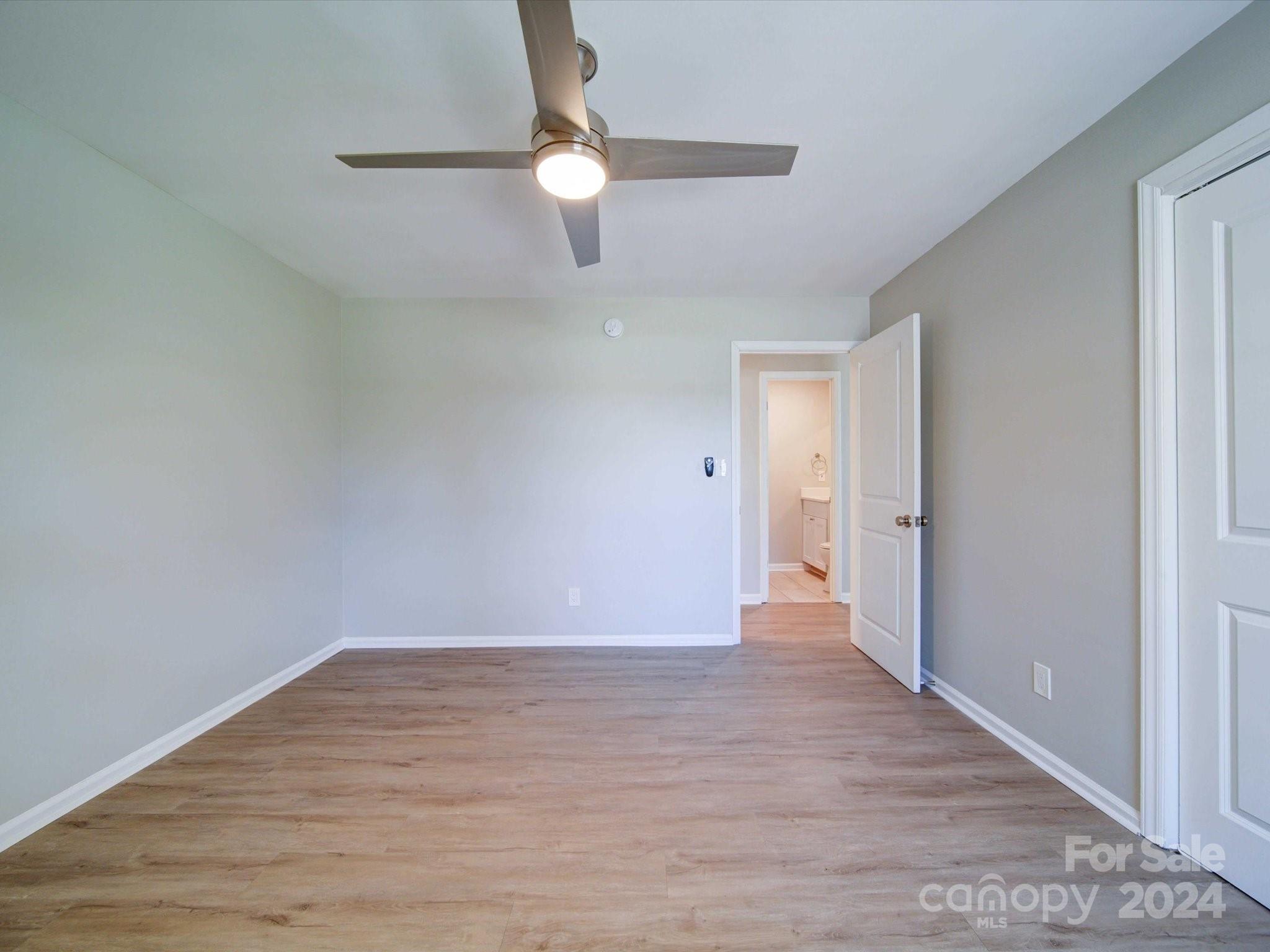 101 Hedgestone Drive Gastonia, NC 28056 - Photo 33 of 39 a view of an empty room with wooden floor