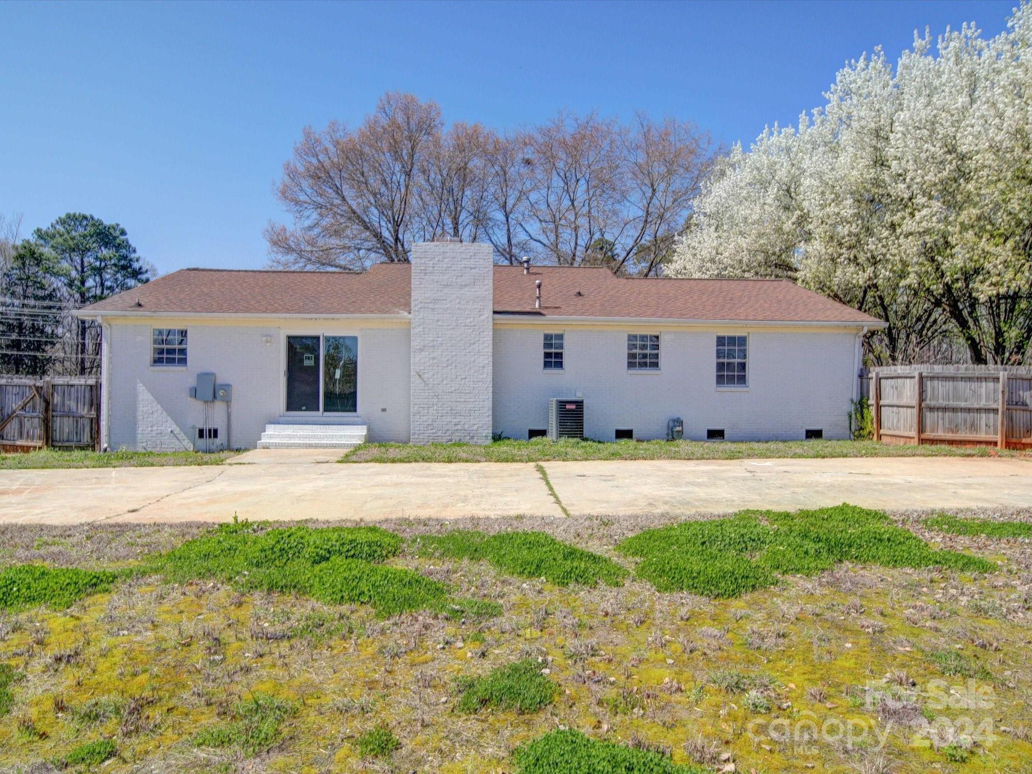 101 Hedgestone Drive Gastonia, NC 28056 - Photo 5 of 39 a view of a house with a yard and garage