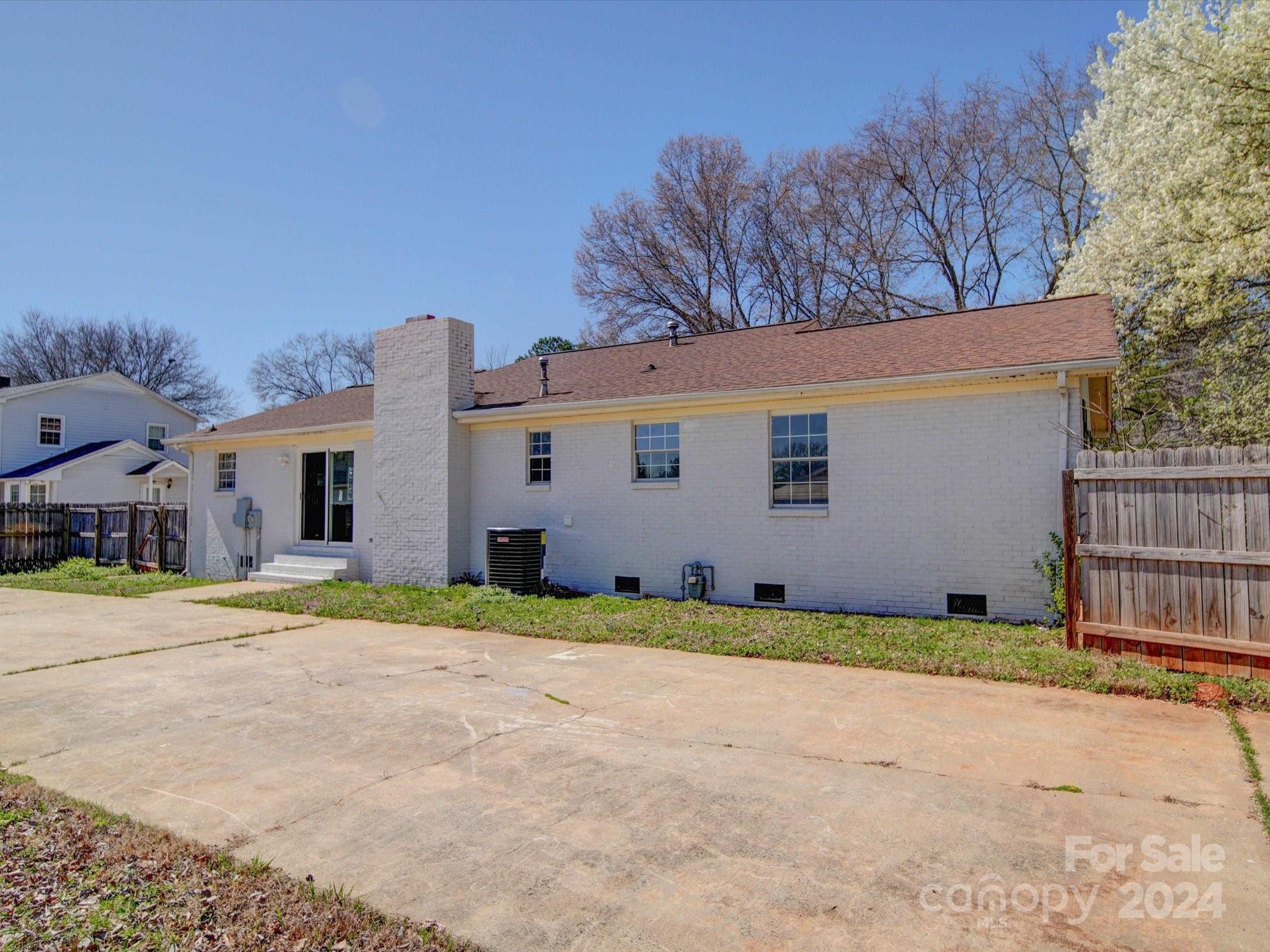 101 Hedgestone Drive Gastonia, NC 28056 - Photo 7 of 39 a view of a house with a yard and garage