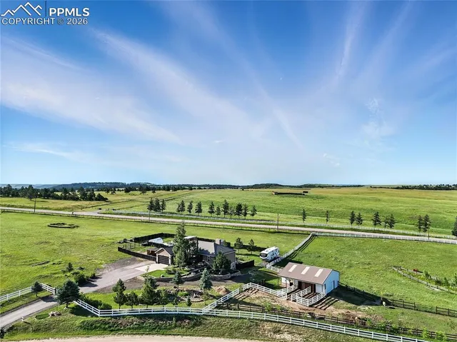a view of a lake with a big yard