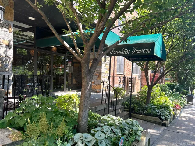 a sign that is in front of house