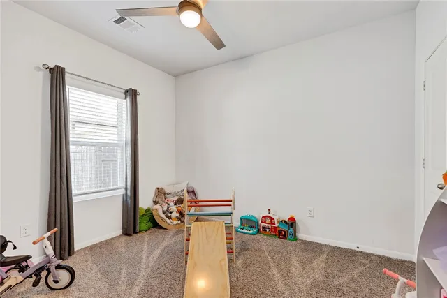 a room with furniture and a window