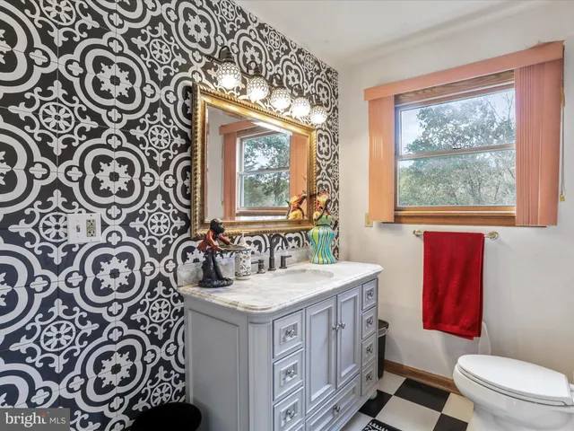 a room with furniture and a rug