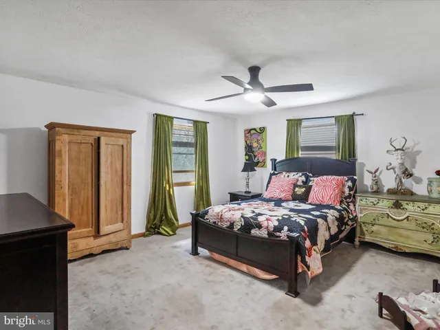 a view of a chairs and tables in patio