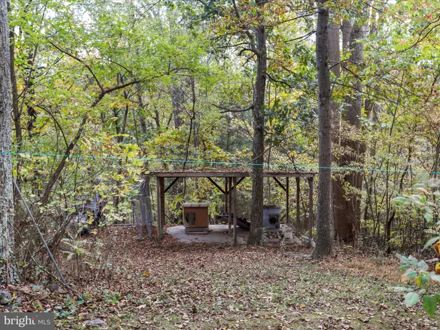 a balcony with table and chairs
