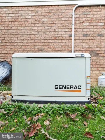 a view of a balcony with furniture and wooden floor