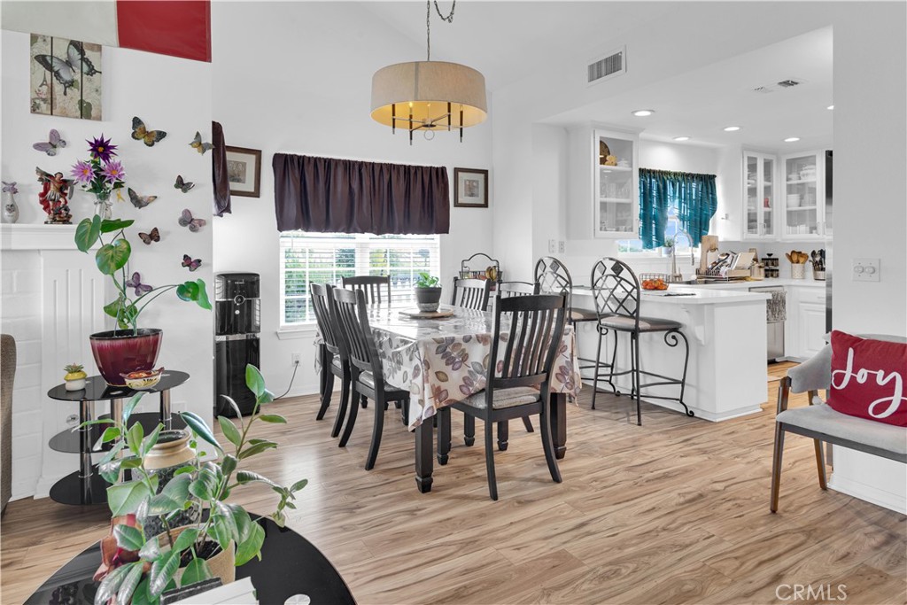 53500 Bradley Lockwood Road Bradley, CA 93426 - Photo 11 of 30 a view of a dining room with furniture and wooden floor