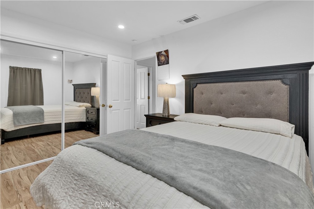 53500 Bradley Lockwood Road Bradley, CA 93426 - Photo 13 of 30 a bedroom with bed and walk in closet