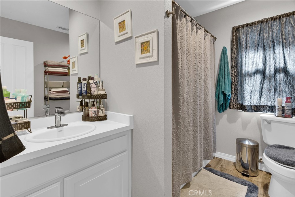 53500 Bradley Lockwood Road Bradley, CA 93426 - Photo 15 of 30 a bathroom with a sink and a mirror