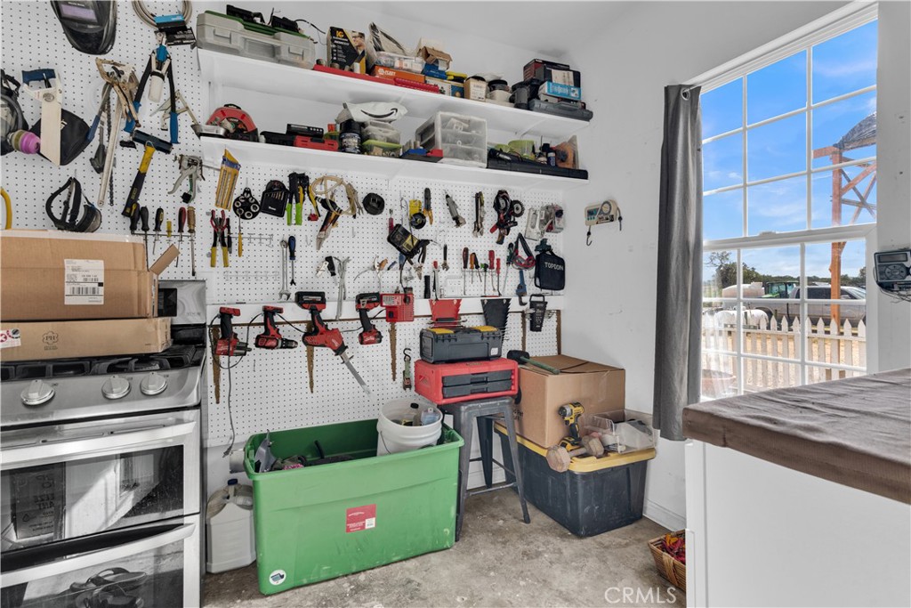 53500 Bradley Lockwood Road Bradley, CA 93426 - Photo 19 of 30 a living room with lots of furniture and white walls