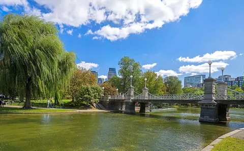 a view of a lake with a house