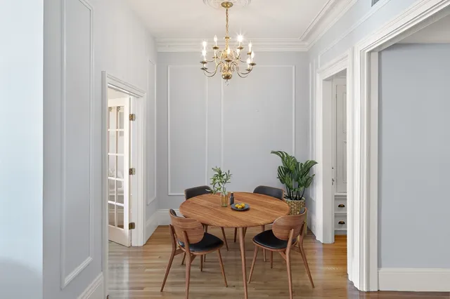 a table and chairs in a room