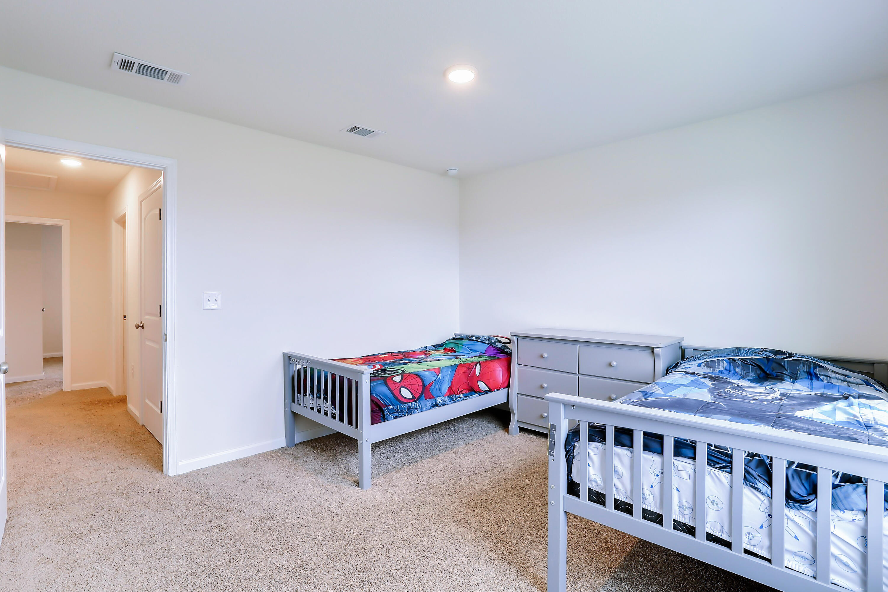 931 Merganser Way Crestview, FL 32539 - Photo 38 of 39 a bedroom with furniture and baby crib