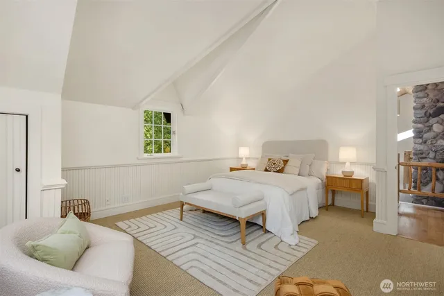 a bed room with a bed and a couch